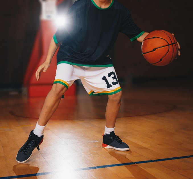 Kids Basketball Training. Young Basketball Player Dribble the Ba